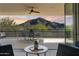 Indoor living space showcases a balcony with mountain views, creating a serene and inviting atmosphere at 5527 E Arroyo Verde Dr, Paradise Valley, AZ 85253