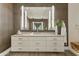 Primary bathroom with dual sink vanity with ample drawer space and designer mirror at 5527 E Arroyo Verde Dr, Paradise Valley, AZ 85253