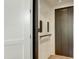 Home elevator with bronze-colored doors and panel with controls for easy access to upper floors at 5527 E Arroyo Verde Dr, Paradise Valley, AZ 85253