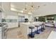 Spacious kitchen with a center island, bar seating, and stainless-steel appliances at 5527 E Arroyo Verde Dr, Paradise Valley, AZ 85253