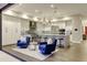 Bright, modern kitchen features a large island, stainless appliances, and comfortable seating area at 5527 E Arroyo Verde Dr, Paradise Valley, AZ 85253
