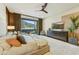 Large main bedroom has private balcony access and sleek furniture at 5527 E Arroyo Verde Dr, Paradise Valley, AZ 85253