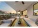 Expansive covered patio with multiple seating areas, ideal for entertaining and outdoor living at 5527 E Arroyo Verde Dr, Paradise Valley, AZ 85253