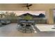 Covered patio includes a dining table with seating, perfect for enjoying outdoor meals with scenic views at 5527 E Arroyo Verde Dr, Paradise Valley, AZ 85253