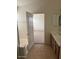 Bathroom with double sink vanity and shower/tub combo at 56 W Holstein Trl, San Tan Valley, AZ 85143