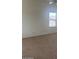 Primary bedroom with plush carpeting and a ceiling fan at 56 W Holstein Trl, San Tan Valley, AZ 85143