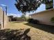The backyard features a grassy area and a wooden fence, perfect for outdoor activities and privacy at 601 W 15Th St, Tempe, AZ 85281