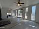 Spacious room featuring concrete floors, several windows, and a sliding glass door at 601 W 15Th St, Tempe, AZ 85281