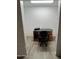 Minimalist office features desk, rolling chair, and ample lighting for productivity at 601 W 15Th St, Tempe, AZ 85281