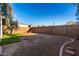 Large backyard featuring grass and block wall for privacy at 6331 W Winslow Ave, Phoenix, AZ 85043