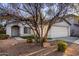 Charming one-story home with a two-car garage, complemented by desert landscaping at 6331 W Winslow Ave, Phoenix, AZ 85043