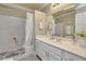 Bright bathroom featuring a shower-tub combination, modern vanity, and neutral color palette at 6730 E Hermosa Vista Dr # 38, Mesa, AZ 85215