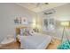 Charming bedroom with hardwood floors, window with shutters, ceiling fan, and a well-lit atmosphere at 6730 E Hermosa Vista Dr # 38, Mesa, AZ 85215