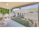 Enclosed patio with stone pavers and artificial grass at 6730 E Hermosa Vista Dr # 38, Mesa, AZ 85215