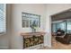 Stylish foyer with a decorative table and window box at 6801 E Sheena Dr, Scottsdale, AZ 85254