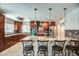 Lovely kitchen featuring wood cabinets, stainless steel appliances, and a granite island with seating at 6801 E Sheena Dr, Scottsdale, AZ 85254