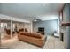Spacious living room with an open layout, featuring a fireplace and ample seating at 6801 E Sheena Dr, Scottsdale, AZ 85254