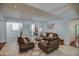 Comfortable living room featuring tile floors, recessed lighting, and neutral paint at 6801 E Sheena Dr, Scottsdale, AZ 85254