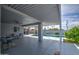 Expansive covered patio with a view of the sparkling pool, ideal for outdoor entertaining and relaxation at 6801 E Sheena Dr, Scottsdale, AZ 85254