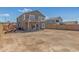 Spacious backyard featuring a patio area and views of the home's exterior at 7230 N 70Th Ln, Glendale, AZ 85303