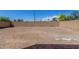 Spacious backyard with block fence, ready for landscaping and customization at 7230 N 70Th Ln, Glendale, AZ 85303