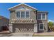 Beautiful two-story home with an attached two-car garage and an attractive front facade at 7230 N 70Th Ln, Glendale, AZ 85303