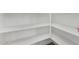 Walk-in pantry with plenty of shelving for storage at 7230 N 70Th Ln, Glendale, AZ 85303
