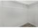 Walk-in closet has painted walls and built-in shelving offering plenty of storage solutions at 7230 N 70Th Ln, Glendale, AZ 85303