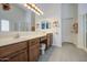 Bathroom featuring a double vanity, separate shower, and tile floors at 737 W Desert Valley Dr, San Tan Valley, AZ 85143