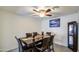 Formal dining room with modern ceiling fan and elegant decor at 737 W Desert Valley Dr, San Tan Valley, AZ 85143