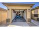 Well-lit two-car garage with organized storage, tools, and a SimpliSafe security system for peace of mind at 737 W Desert Valley Dr, San Tan Valley, AZ 85143