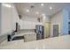 Beautiful kitchen with white cabinets, stainless steel appliances, and marble countertops at 737 W Desert Valley Dr, San Tan Valley, AZ 85143