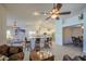 Bright living room with an open layout, ceiling fan, and tiled floors at 737 W Desert Valley Dr, San Tan Valley, AZ 85143