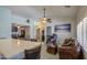 Spacious living room with tiled floors, ceiling fan and a relaxing atmosphere with living room seating at 737 W Desert Valley Dr, San Tan Valley, AZ 85143