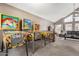 A home with a retro vibe featuring a game room with multiple vintage pinball machines at 7402 W Kerry Way, Glendale, AZ 85308
