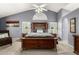 This spacious main bedroom features a ceiling fan and high ceilings at 7402 W Kerry Way, Glendale, AZ 85308