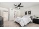 Bedroom featuring neutral colors, decorative art, carpet and ensuite bathroom at 7467 E Pleasant Run, Scottsdale, AZ 85258