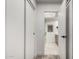 Hallway with door to bathroom and storage closet at 7467 E Pleasant Run, Scottsdale, AZ 85258