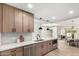 Bright, modern kitchen features a subway tile backsplash, stainless appliances and an open floor plan at 7467 E Pleasant Run, Scottsdale, AZ 85258