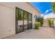The patio features a large sliding glass door that creates an open flow to the interior at 7467 E Pleasant Run, Scottsdale, AZ 85258