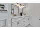 Chic bathroom features a double vanity with sleek sinks, modern lighting, and stylish mirrors at 7826 N 21St Ln, Phoenix, AZ 85021