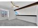 Bright and airy bedroom features high ceilings, a ceiling fan, and ample natural light at 7826 N 21St Ln, Phoenix, AZ 85021