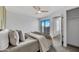 Bright bedroom with a plush bed, soft pillows, and a sliding glass door to a balcony at 7826 N 21St Ln, Phoenix, AZ 85021