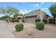 Beautiful home with desert landscaping, rock accents, and a private courtyard at 8235 E Sierra Pinta Dr, Scottsdale, AZ 85255