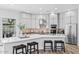 Bright, well-equipped kitchen with white cabinets and a stylish backsplash at 8235 E Sierra Pinta Dr, Scottsdale, AZ 85255