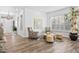 Comfortable living room with tile floors, plantation shutters, and stylish decor at 8235 E Sierra Pinta Dr, Scottsdale, AZ 85255