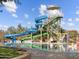 Gathering-friendly community pool with thrilling water slides and a splash zone for children at 8577 W Trenton Ct, Florence, AZ 85132