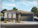 Charming single-story home featuring stone accents, a two-car garage, and desert landscaping at 8577 W Trenton Ct, Florence, AZ 85132