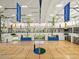 Large indoor gymnasium featuring basketball and volleyball, with gym equipment overlooking the court at 8577 W Trenton Ct, Florence, AZ 85132