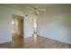 Spacious bedroom with wood floors and a ceiling fan, offering a comfortable and relaxing retreat at 945 N Pasadena -- # 84, Mesa, AZ 85201